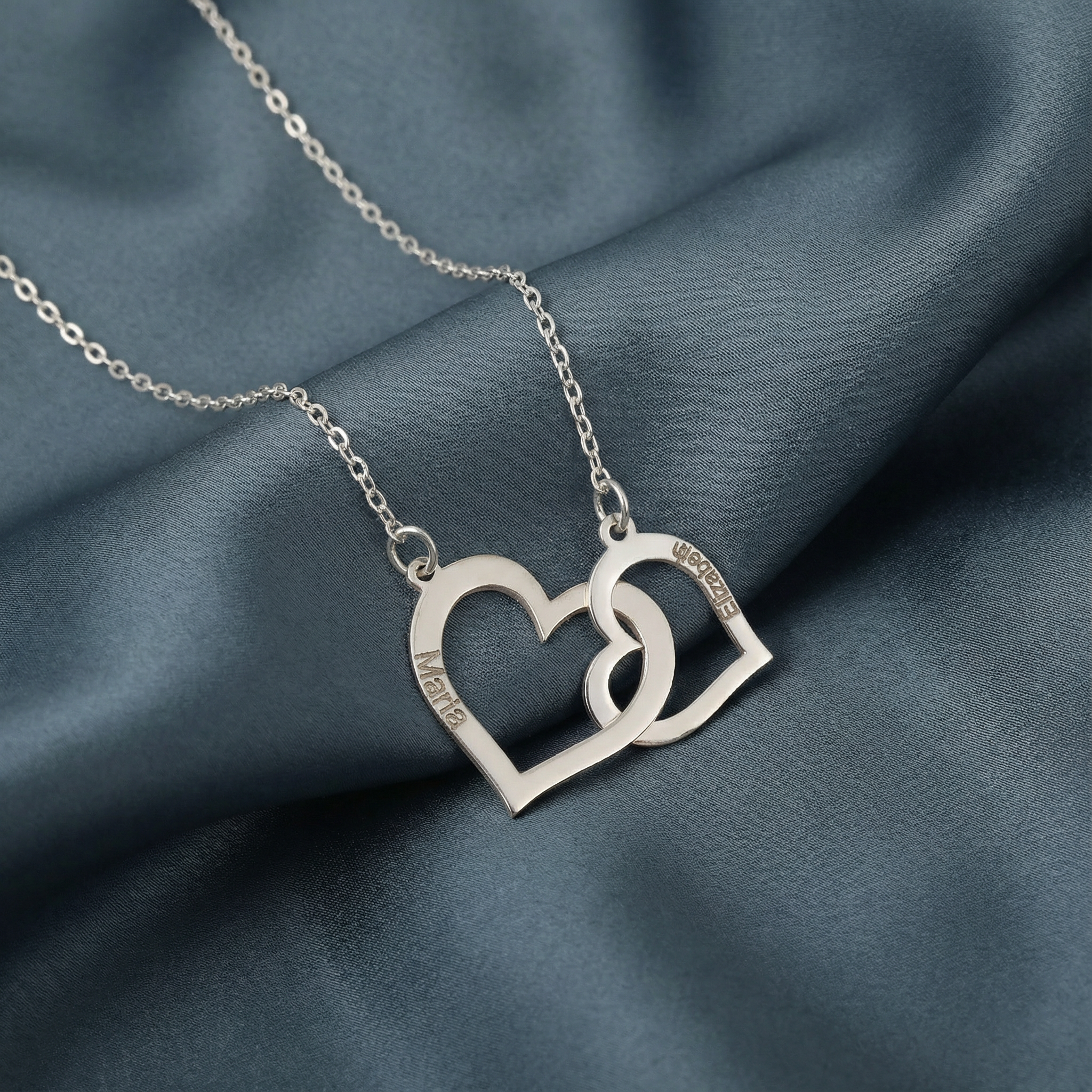 Gümüş İç İçe Geçmiş İsimli Kalp Kolye